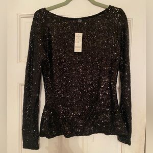 Bebe black sequenced top. Stretchy. Brand new with tags. Size Small